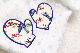 Snow Mittens Applique: A Cozy Addition to Your Holiday Line